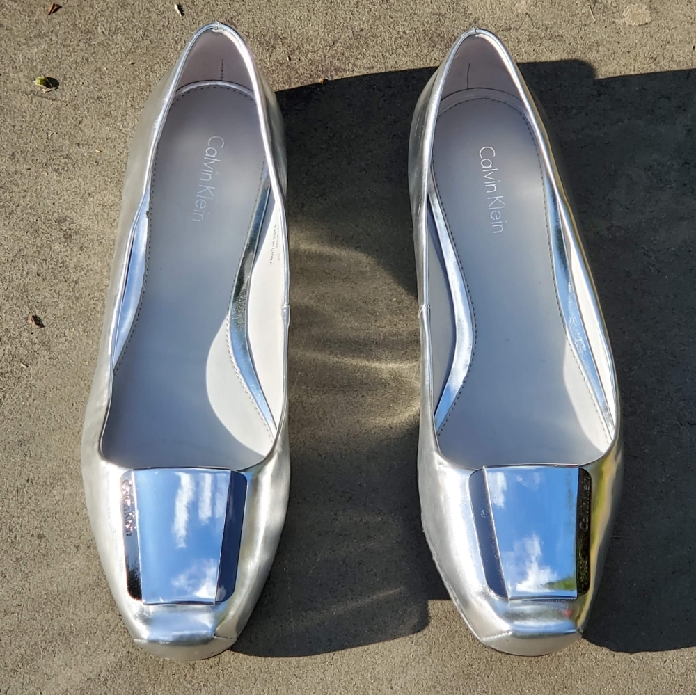 Calvin Klein silver chrome flats